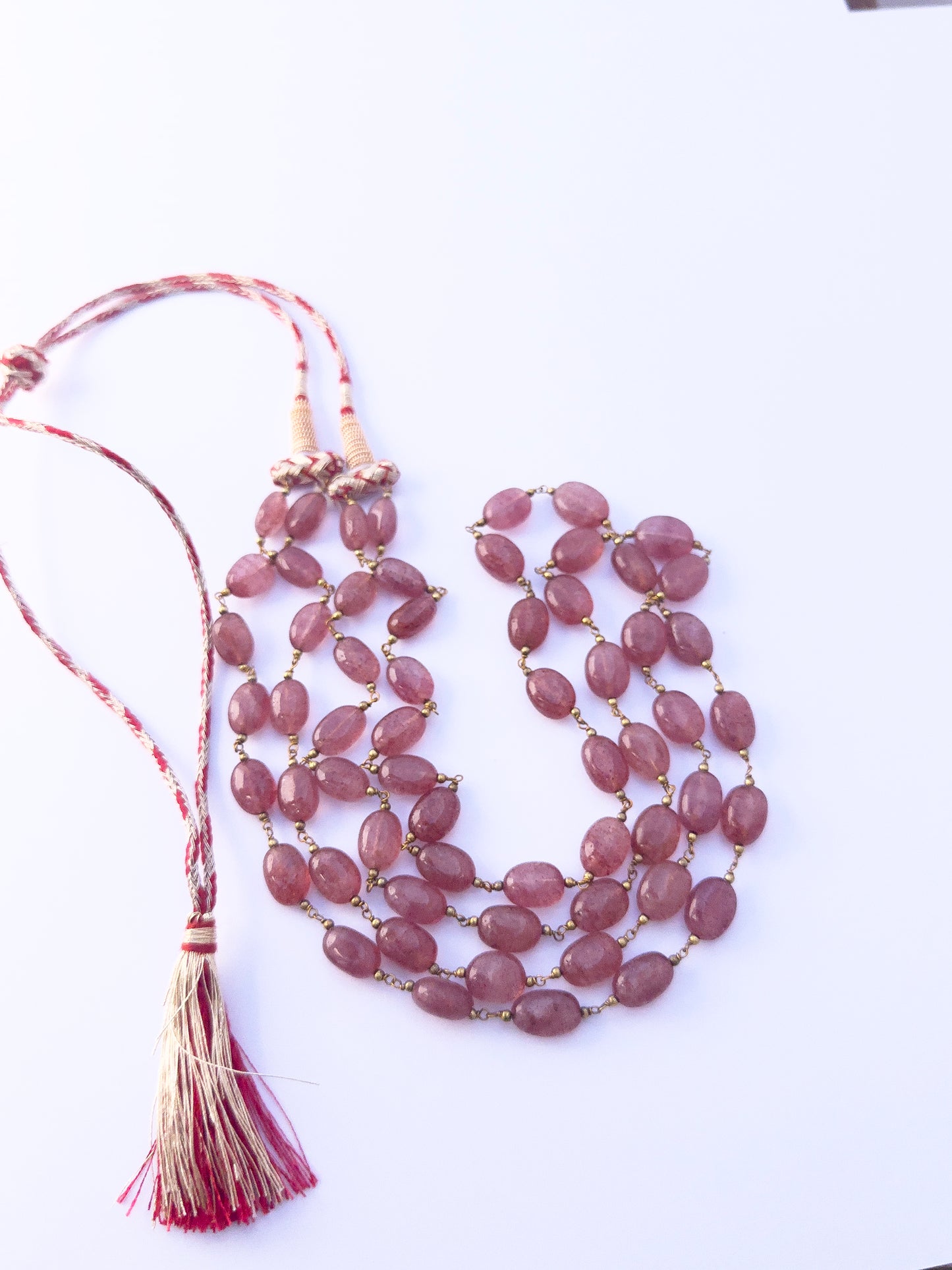 Elegant Strawberry Quartz necklace, two strands of smooth oval beads, 313 carats of brilliance.