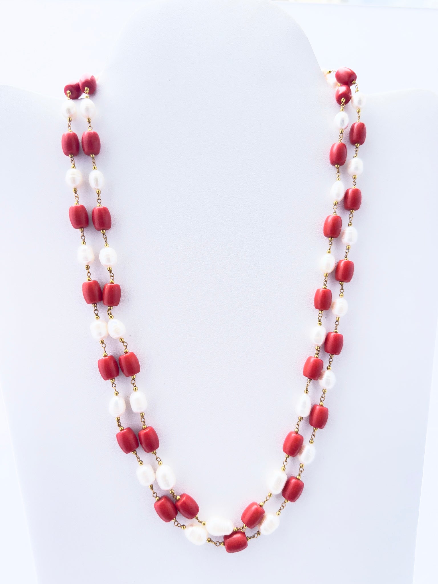 Taiwan Coral and pearl necklace, two strands, 306 carats of brilliance with silk tassel accent.
