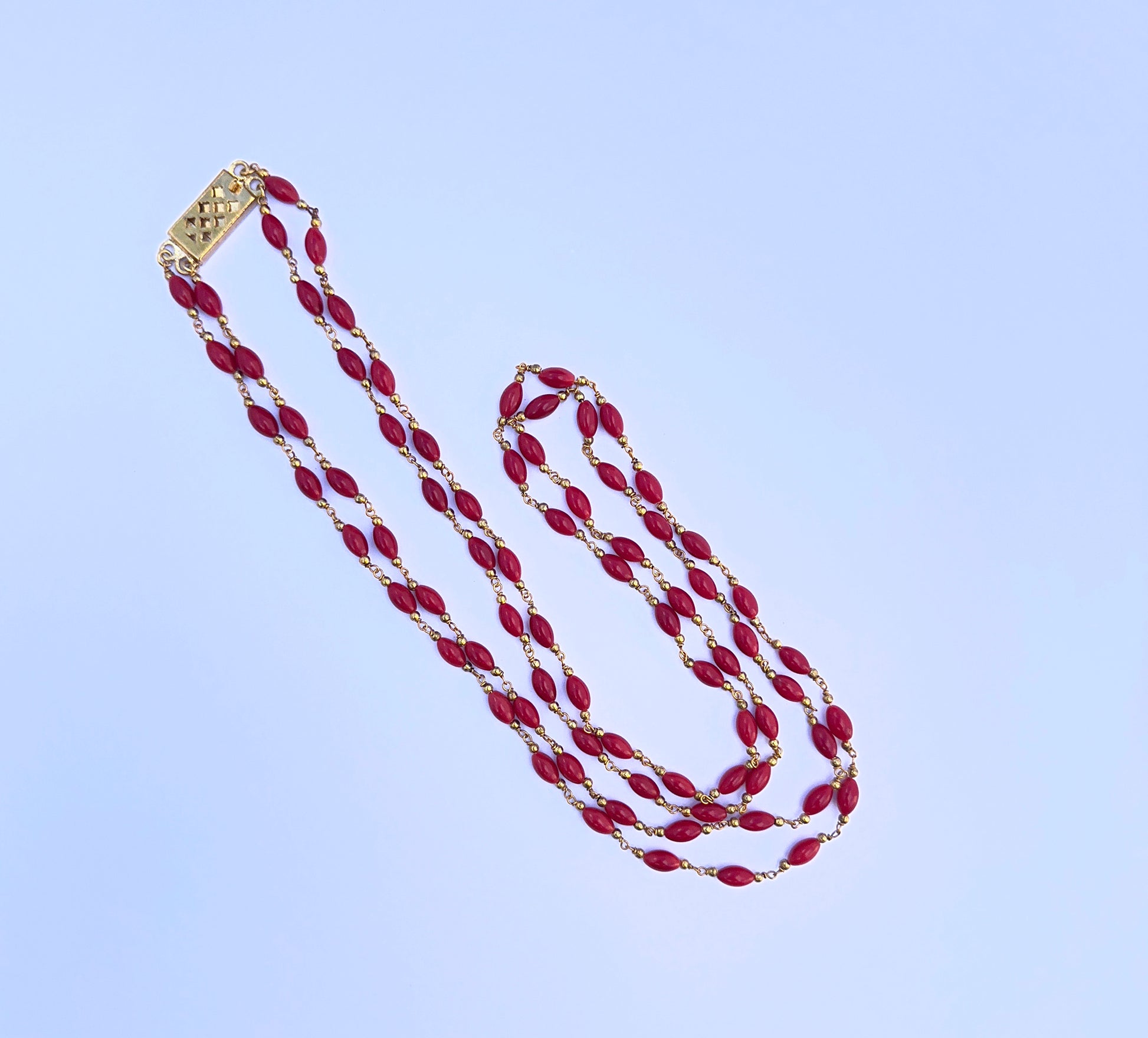 Elegant 2 strand coral necklace crafted from natural gemstone beads, 4mm smooth drum cut, timeless jewellery design.