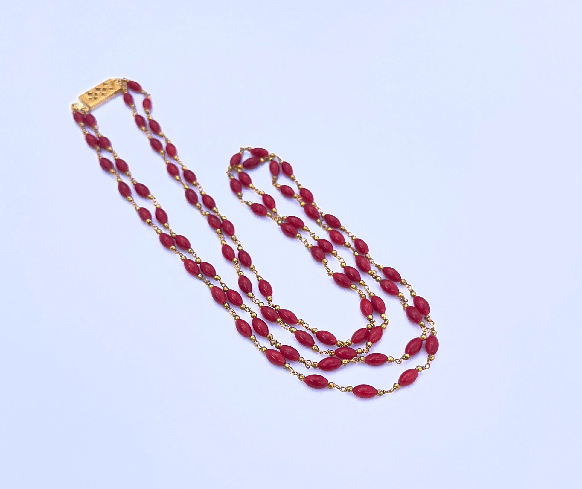 Taiwan coral necklace showcasing natural gemstone beads, smooth drum cut, 87 carats, perfect for jewellery styling.
