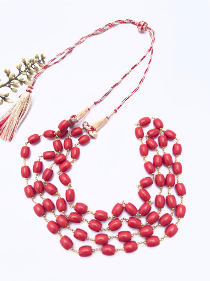 Taiwan Coral gemstone beads necklace, polished drum cut, radiant shine, silk tassel detail.