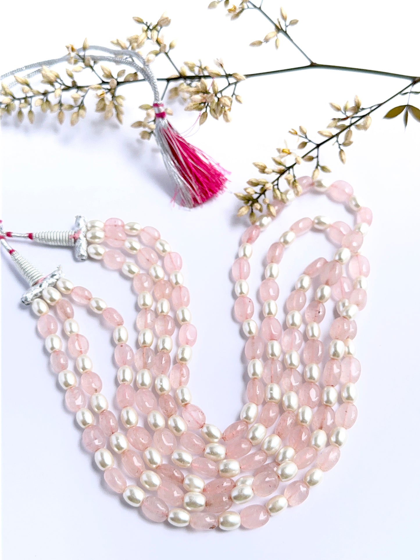 Quartz and pearl necklace with smooth oval beads showing soft lustre and clarity.
