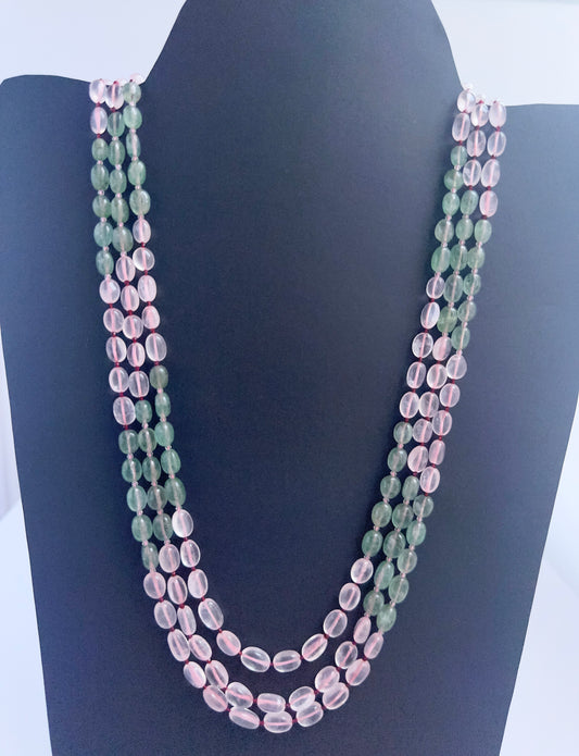 Quartz necklace with smooth oval beads, three strands, 6–7.7mm size, radiant clarity.