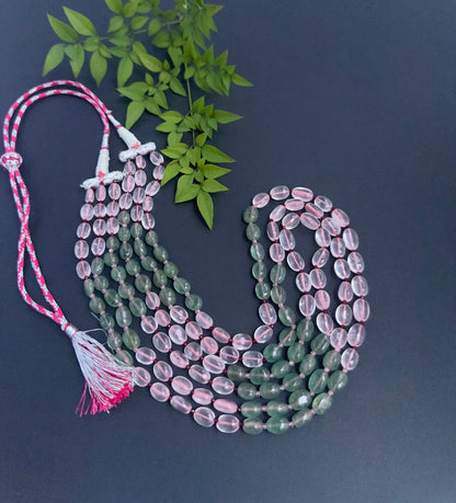 Quartz necklace showcasing natural gemstone beads, smooth oval cut, versatile styling.