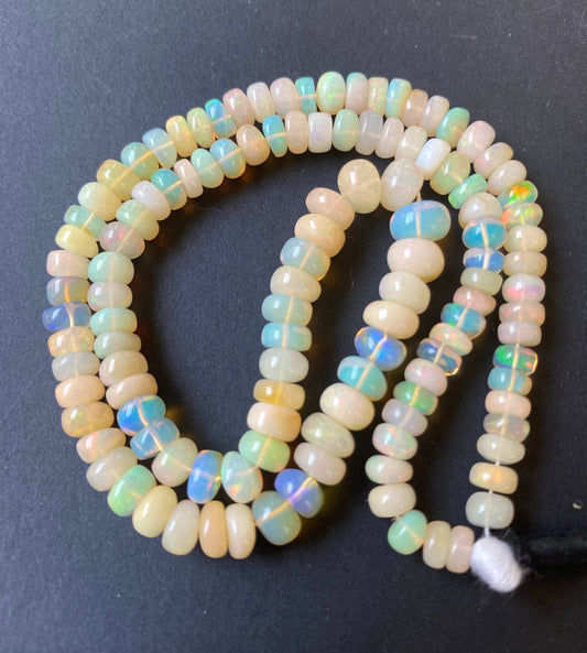Ethiopian Opal | Smooth Wheel | 5.5-7.5mm Bead Size | 42cm Strand Length | 85 Carats