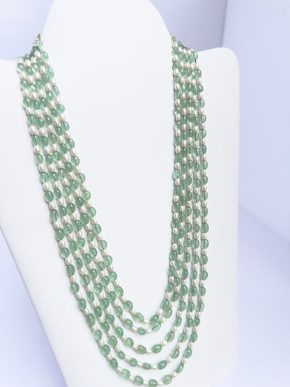 Elegant 5-strand necklace combining quartz and pearls, smooth oval design, 49–61cm adjustable length.