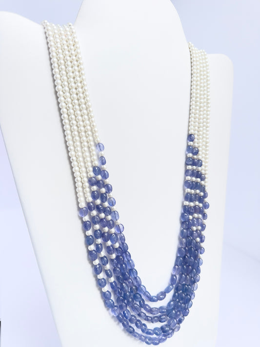 Elegant 5-strand necklace combining quartz and pearls, smooth oval design, 49–59cm adjustable length.