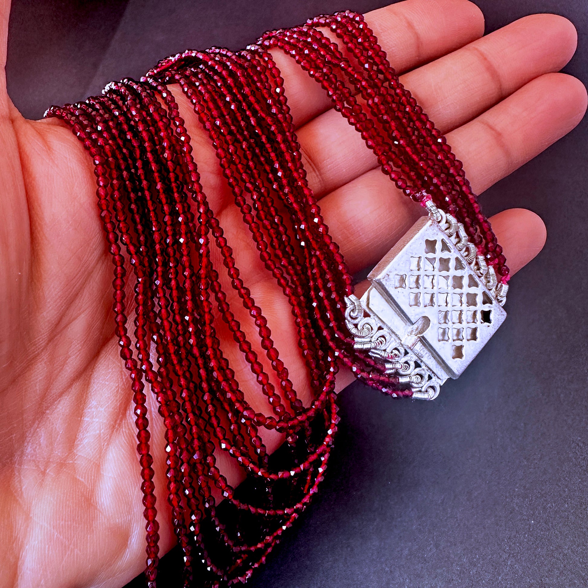 Close-up of faceted rondell chalcedony beads  highlighting natural gemstone brilliance.