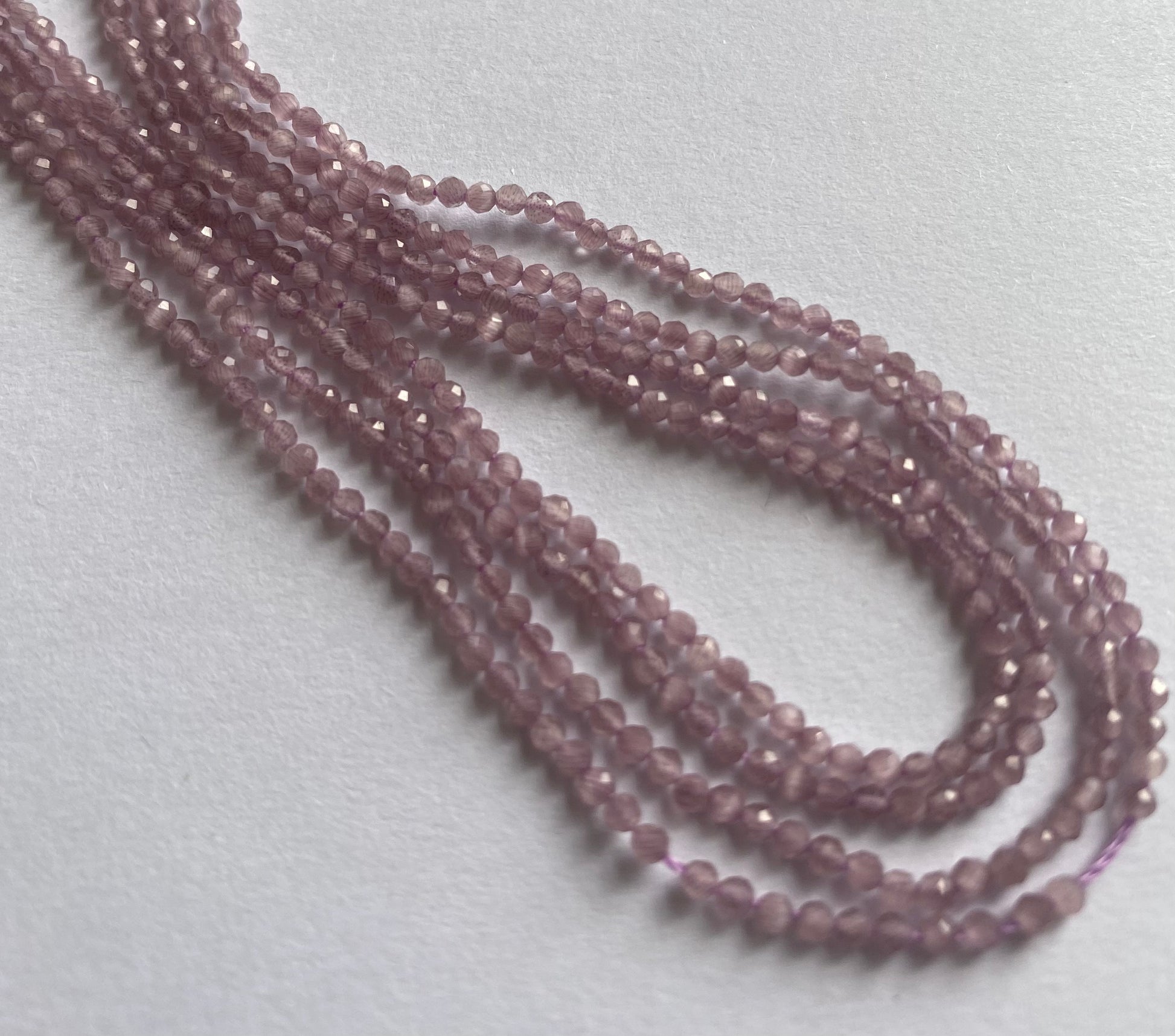 Beautiful  purple amethyst stones, faceted rondelle shaped and faceted, measuring between 2mm and 2.2mm.