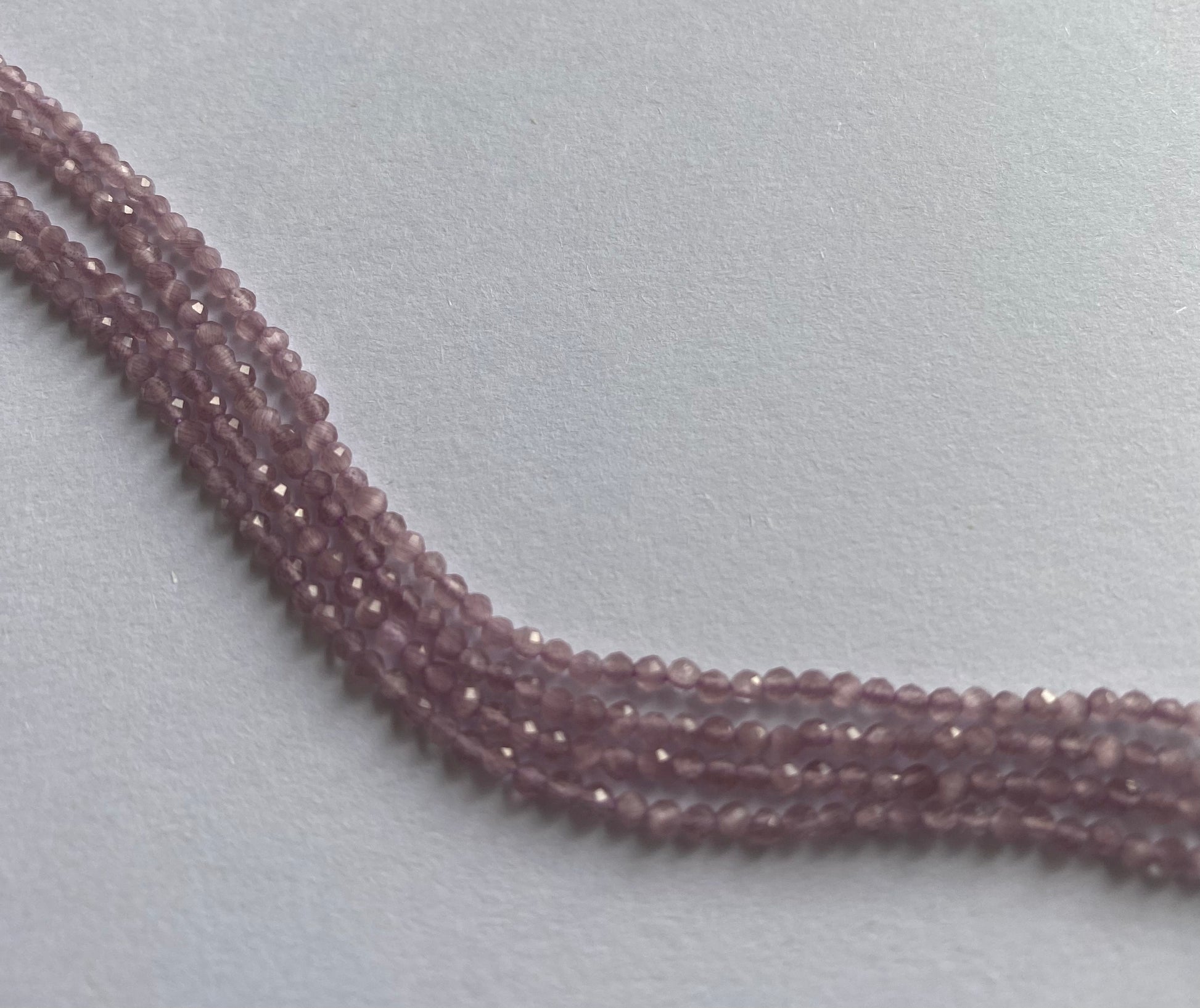 Elegant strand adorned with 2mm to 2.2mm faceted rondelle amethyst stones, showcasing a rich purple colour.