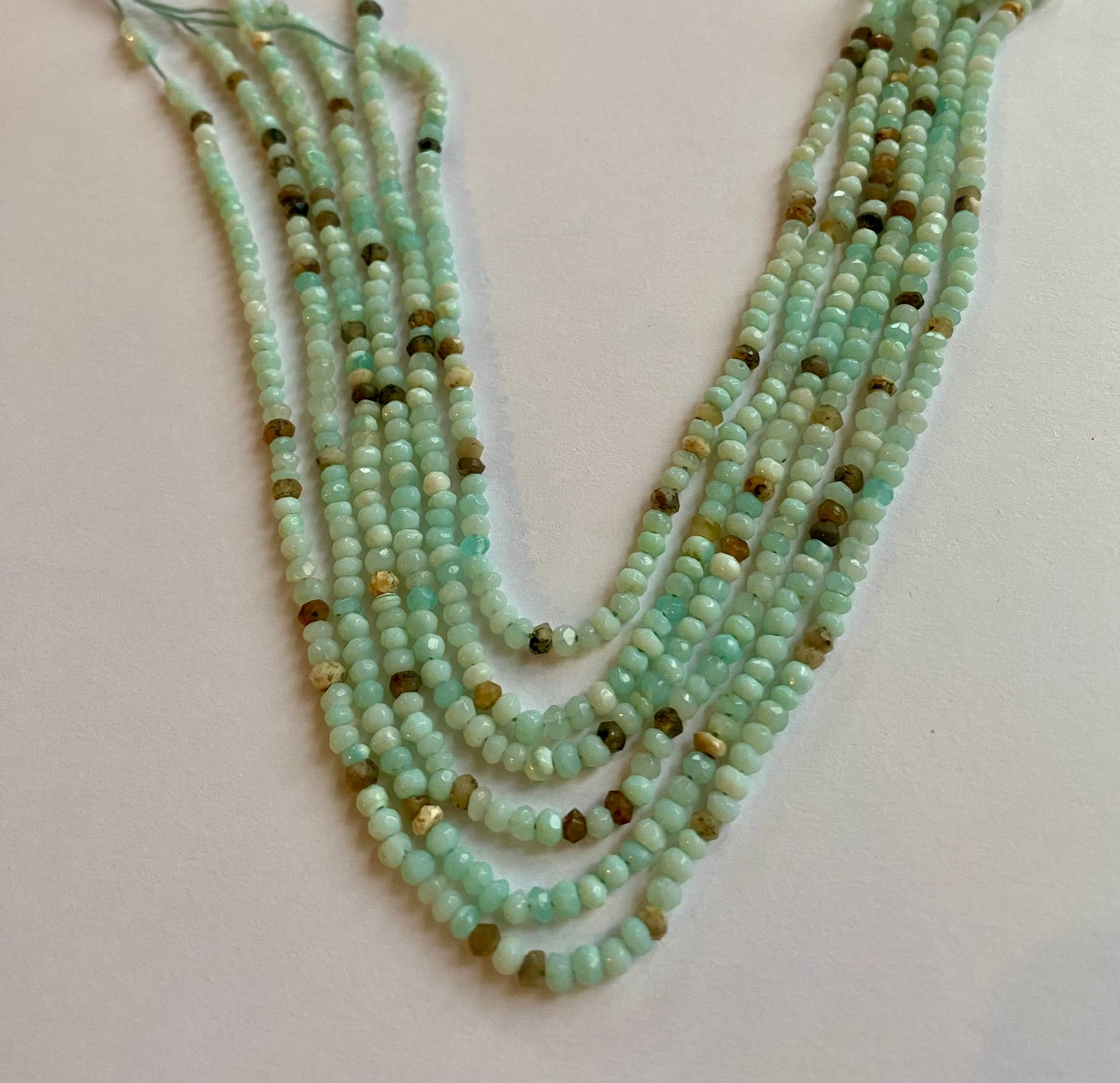  Featuring smooth Australian opal gemstone stone beads, 3-3.5mm in size, showcasing a beautiful aqua hue.