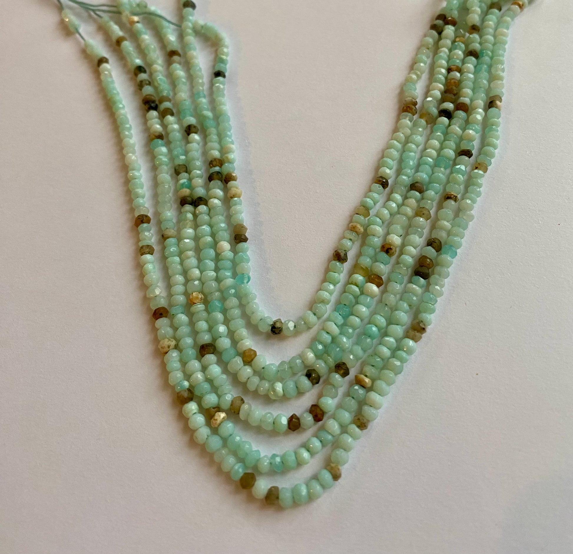  Featuring smooth Australian opal gemstone stone beads, 3-3.5mm in size, showcasing a beautiful aqua hue.