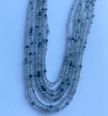 Elegant strand adorned with 2mm Black Rutile  micro faceted rondelle beads, perfect for adding a pop of colour.