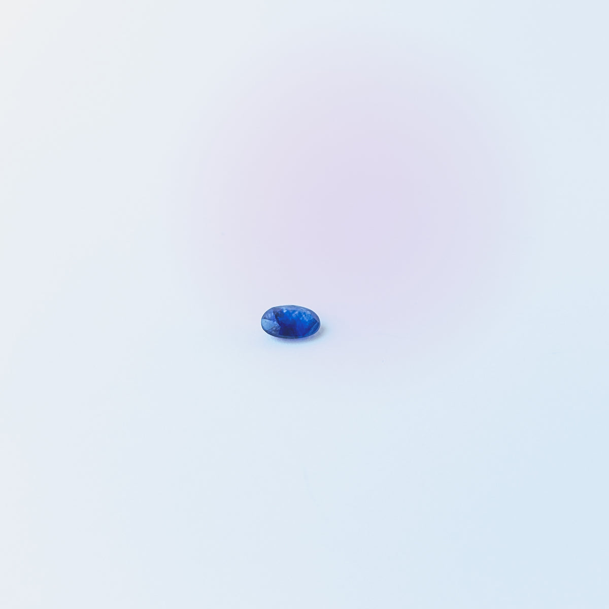 Authentic Blue Sapphire faceted cabochon highlighting premium clarity, lustre and gemstone quality.