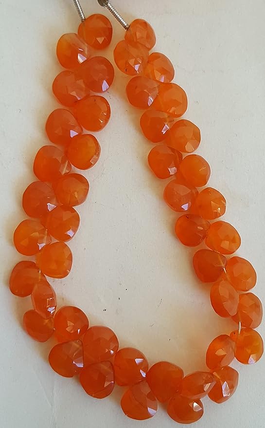 A strand crafted from natural carnelian gemstone, with beads sized 8mm, radiating warmth and elegance.