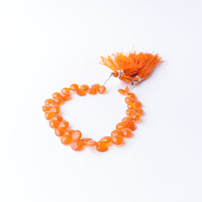 Authentic Carnelian stone beads featuring faceted briolette shapes ideal for luxury handmade jewellery designs.
