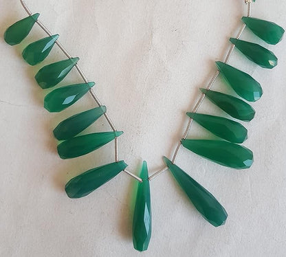 Elegant strand adorned with faceted Chalcedony stones, showcasing a rich green colour.