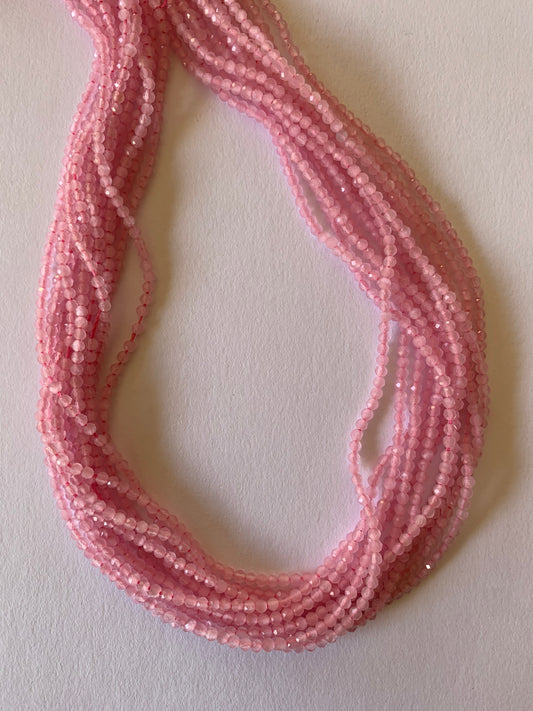 A striking strand of natural chalcedony beads, with 2mm to 2.2mm pink faceted rondelles, perfect for adding colour to creations.