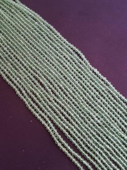 Elegant strands adorned with 2.5mm green chalcedony faceted rondelle beads, perfect for adding a pop of colour.