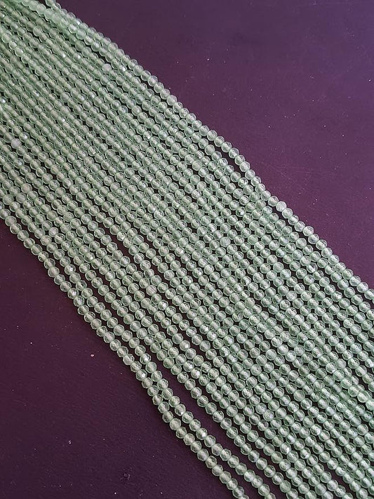 Elegant strands adorned with 2.5mm green chalcedony faceted rondelle beads, perfect for adding a pop of colour.