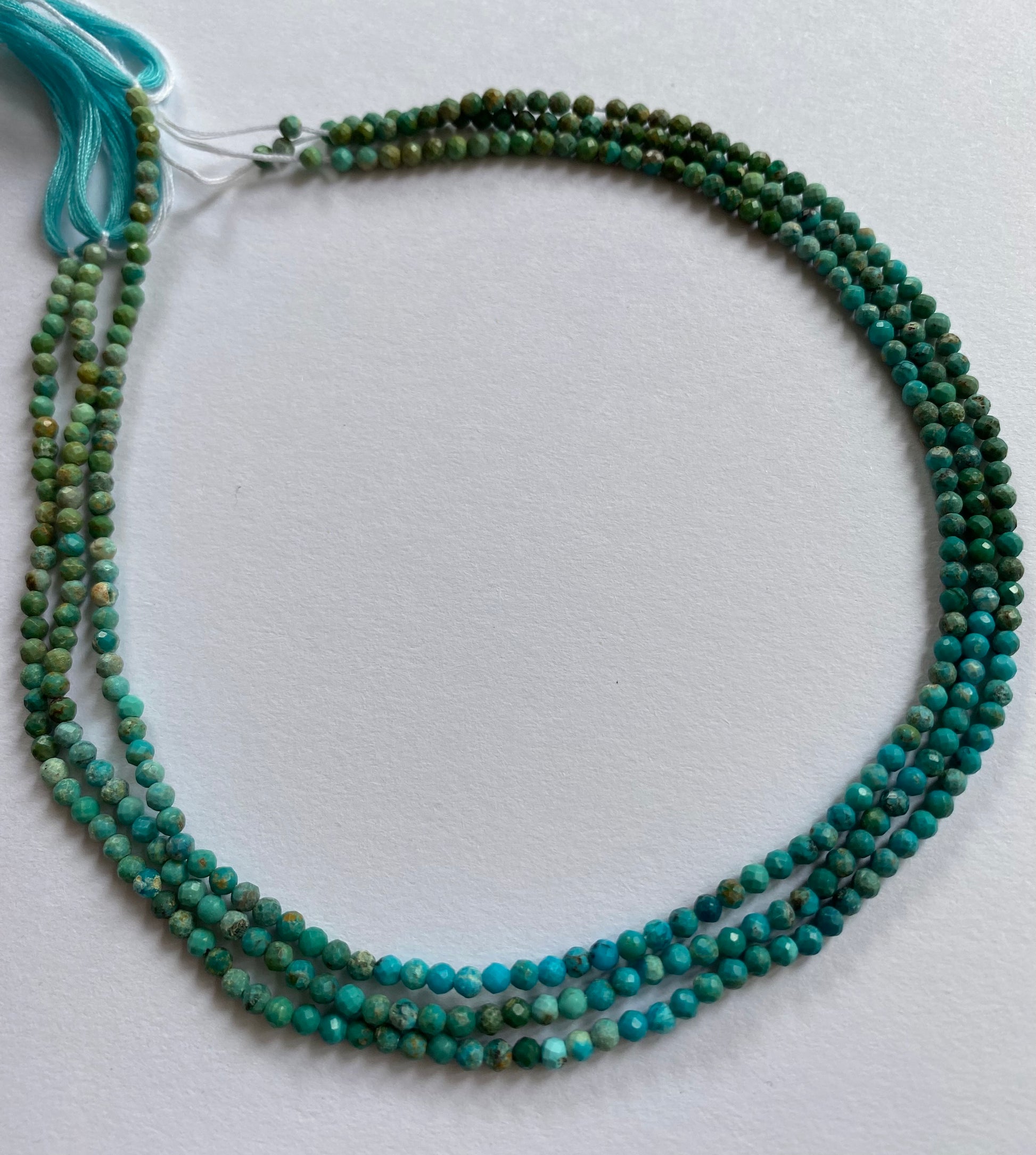 Strand featuring 3mm faceted rondelle beads in a vibrant colour, showcasing the beauty of Chrysocolla.