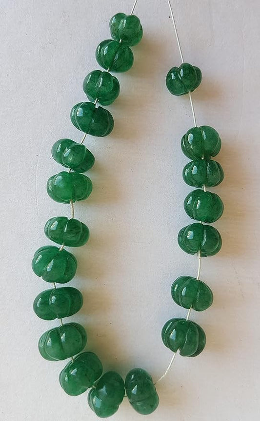 Stunning strand with 7mm to 9mm green Emerald carved rondelle beads, ideal for a stylish accessory.