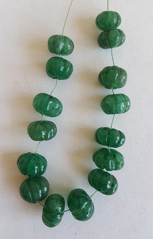 Elegant strand adorned with 9mm to 10mm carved rondelle stones, showcasing a rich green colour.