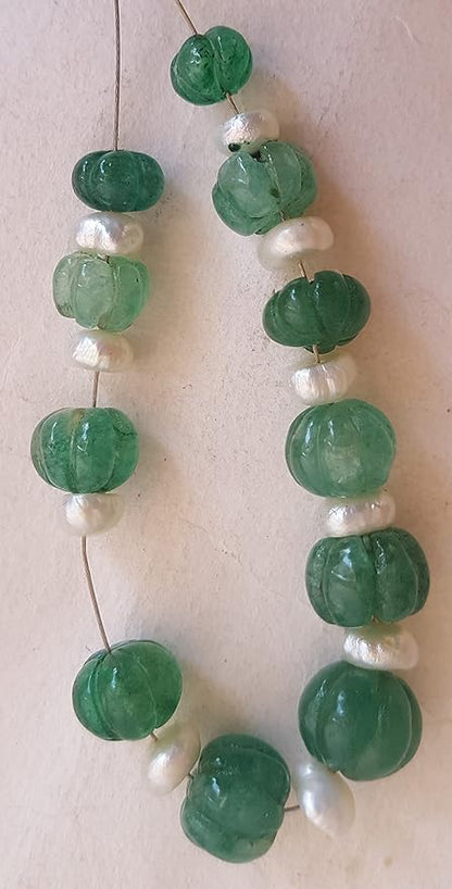 Green emeralds bead adorned with freshwater pearls, showcasing a carved rondelle design, measuring 7mm to 10mm.