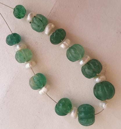 Green emerald natural gemstone bead with freshwater pearls, beautifully carved in a rondelle shape, sizes ranging from 7mm to 10mm.