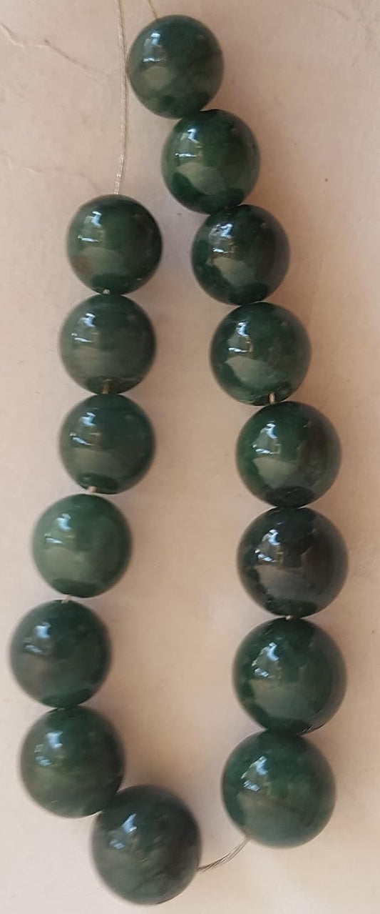 Strand  featuring smooth emerald rondelle beads, each measuring 8-9mm, showcasing a vibrant green colour.