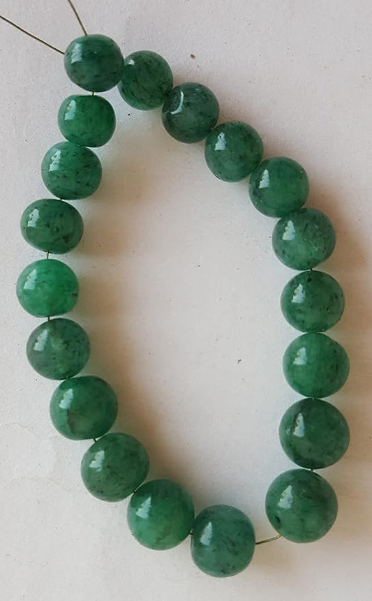  A beautiful strand of green emerald  beads, 7mm to 8mm smooth round, radiating elegance and vibrant colour.