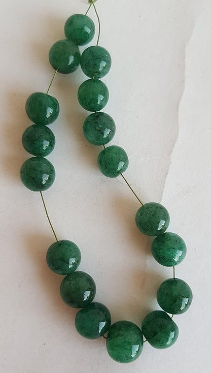 Stunning strand with 7mm to 9mmmm green Emerald smooth round beads, ideal for a stylish accessory.