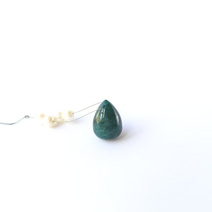 Emerald smooth teardrop gemstone bead with rich green colour and polished shine, ideal for jewellery accents.