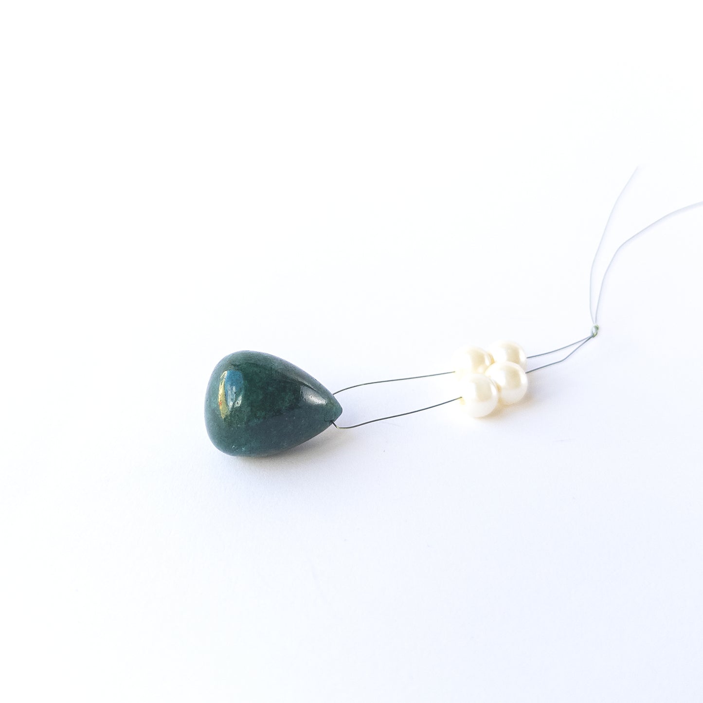 Authentic Emerald teardrop bead with glossy finish, perfect for gemstone beads for DIY jewellery.