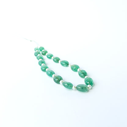 Authentic Green Beryl and Shell Pearl oval beads showcasing smooth finish and elegant colour contrast.