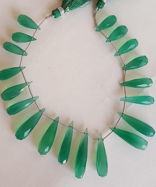  A vibrant green gemstone bead strand, adorned with chalcedony gemstones.