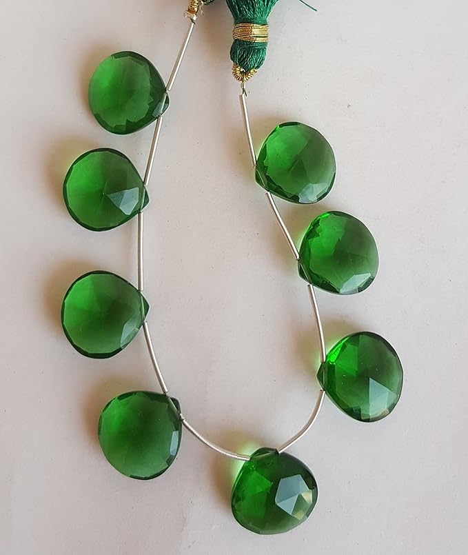  A vibrant strand of  green Hydro faceted  heart beads, highlighting their natural elegance and charm.