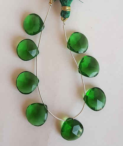  A vibrant strand of  green Hydro faceted  heart beads, highlighting their natural elegance and charm.