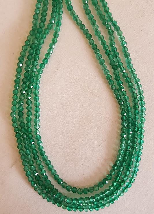 Strand featuring 2mm faceted rondelle beads in a vibrant green colour, showcasing the beauty of onyx.