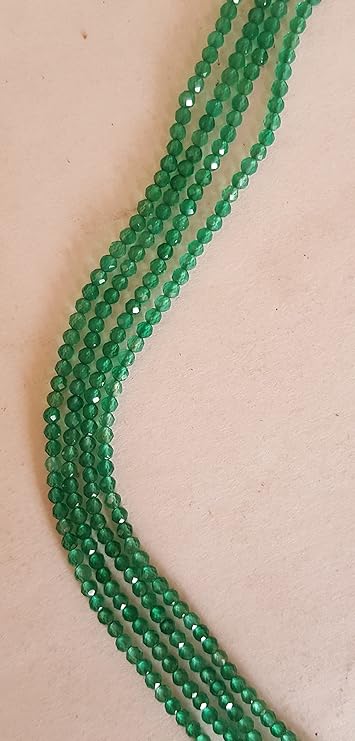 Elegant strand adorned with 32mm green onyxfaceted rondelle beads, perfect for adding a pop of colour.