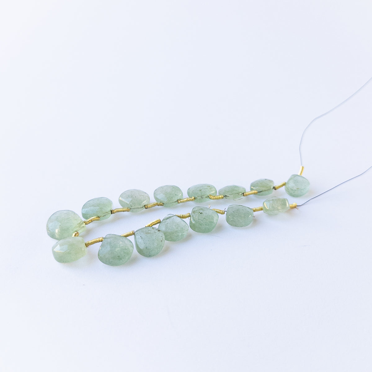 Genuine Green Strawberry Quartz stone beads in faceted briolette cut, ideal for gemstone beads for DIY jewellery.