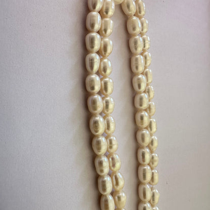 Neatly strung oval Freshwater Pearls in varying sizes with smooth finish.