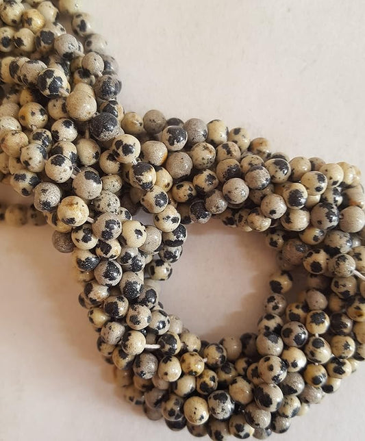 A strand adorned with an array of smooth, round jasper beads, each measuring between 4mm and 4.5mm.  