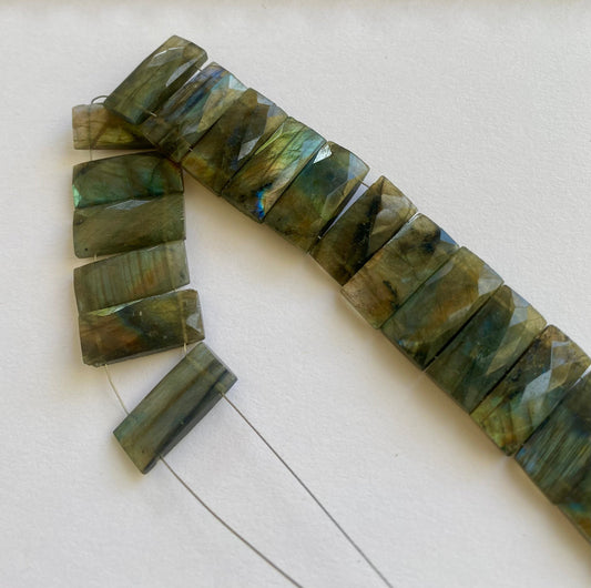 Close-up of 21mm x 9.5–10mm Labradorite rectangle beads showing their natural shimmer.