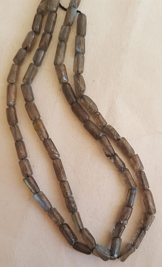 Featuring smooth pipe-shaped brown semi-precious Labradorite gemstone beads.