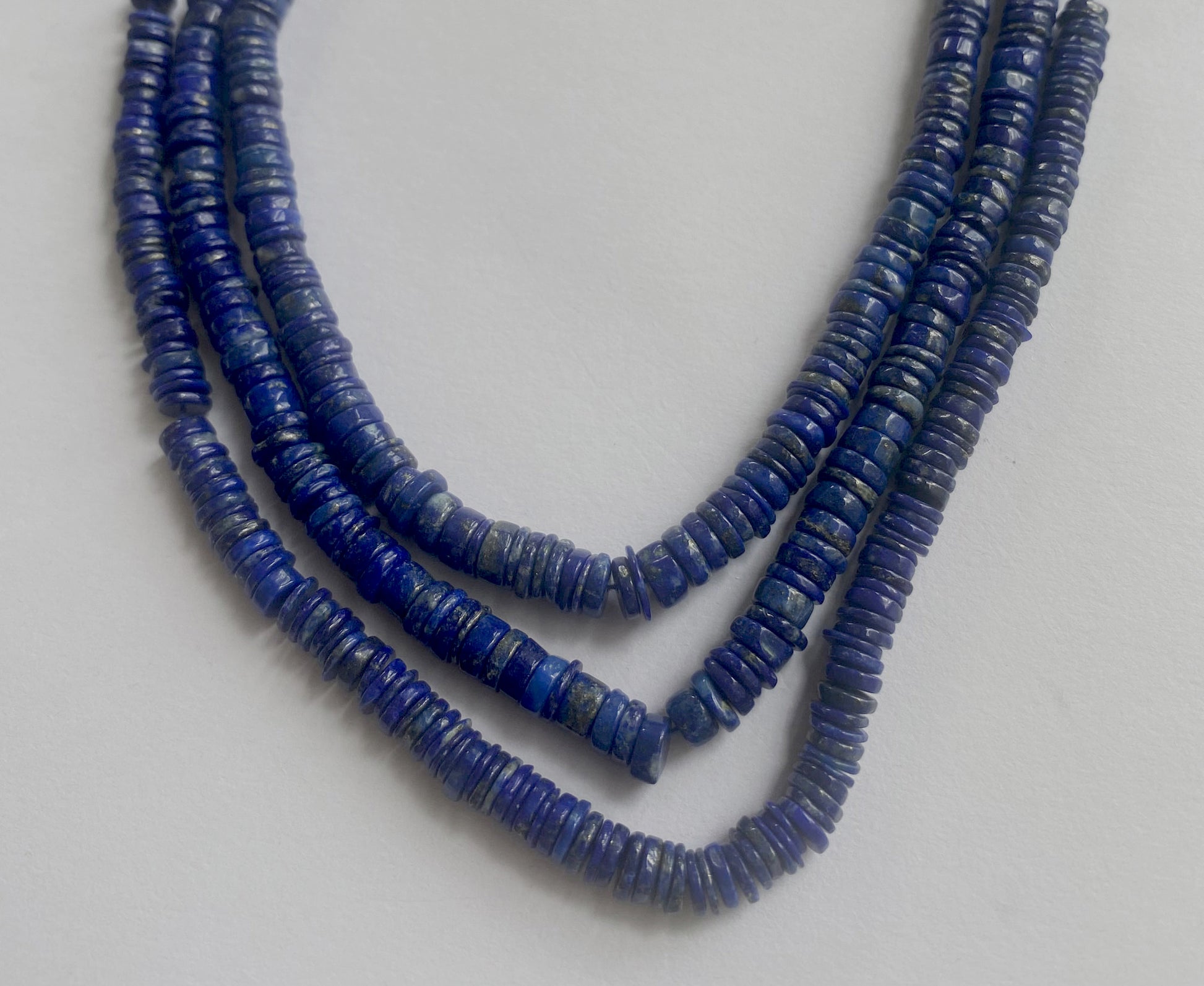 5-5.5mm or 5.5-6mm Lapis Lazuli beads featuring a high-quality finish and uniform arrangement.