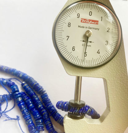 Vibrant Lapis Lazuli gemstone beads with a smooth cut, ideal for jewelry making.