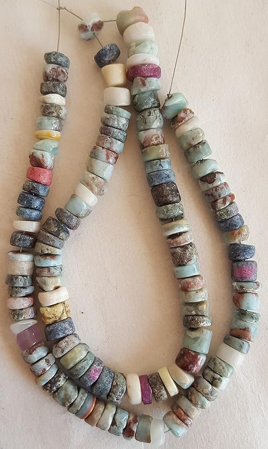 Elegant strand of natural Larimar gemstone, beads sized 6mm to 7mm, highlighting their natural beauty and vibrant colour.
