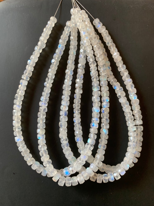 A close-up of a multiple strands  featuring moonstone faceted rondelle beads, measuring 4-5mm in size.