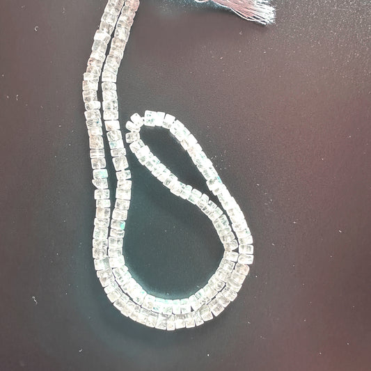 Moonstone smooth wheel beads with pastel hues and glossy finish on a 35cm strand.